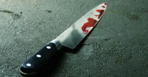 Hombre con orden de arresto mata expareja en su lugar de trabajo en Santiago Oeste 