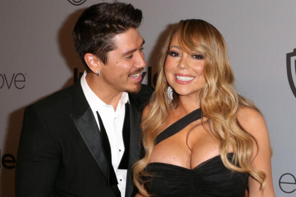 El bailarín Bryan Tanaka y la cantante Mariah Carey. Foto: Fuente externa
