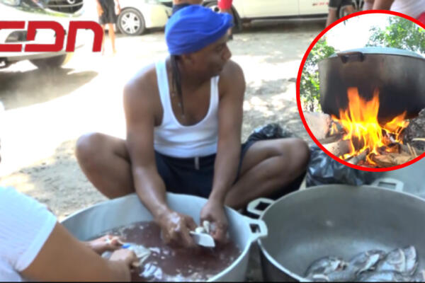 Ciudadanos preparan sus pescados balneario en el municipio Cabral, en Barahona. Foto CDN Digital