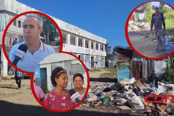 Familias permanecen hacinadas en escuela de Los Alcarrizos. (Foto: CDN Digital)