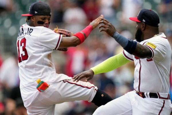 Con jonrones de Ozuna y Acuña los Bravos doblegan a los Astros