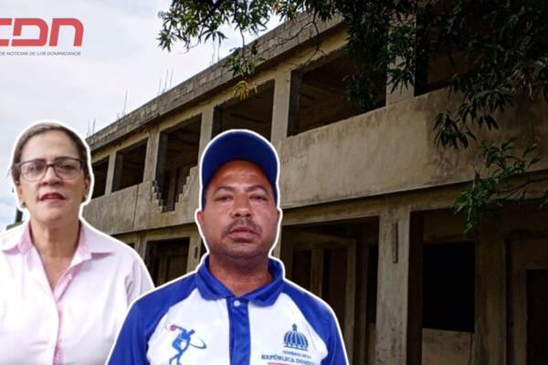 Rosa María de la Cruz, directora del Centro Educativo Mélida Lora y el profesor Fabio de Jesús Mejía Reyes. Foto CDN Digital