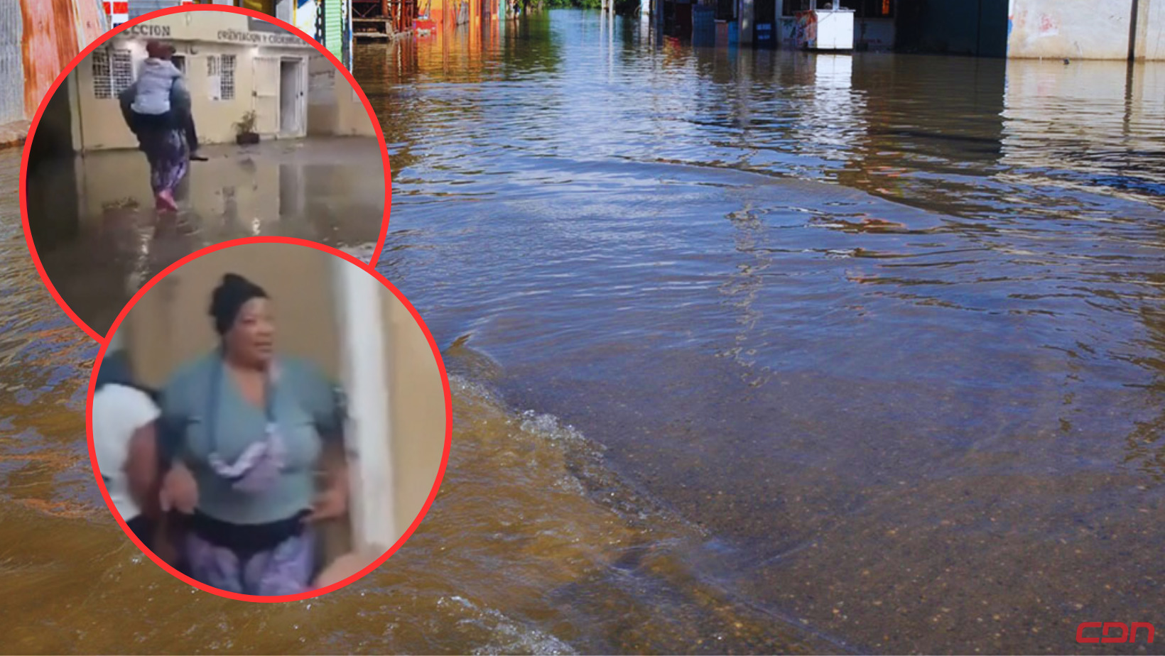 Una conserje carga a las maestras de una escuela inundada en Cotuí. Foto: CDN Digital