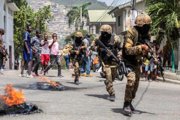 ansados de vivir con miedo, los haitianos esperan con impaciencia la llegada al país de la fuerza multinacional.