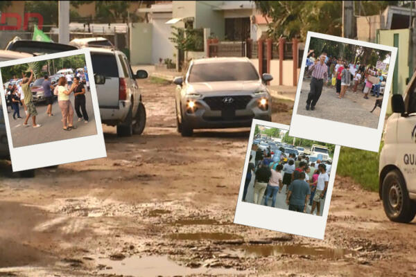 Moradores de Engombe bloquean el tránsito en autopista 6 de Noviembre en protesta por el deterioro de las calles del sector momentáneamente. Foto: CDN Digital