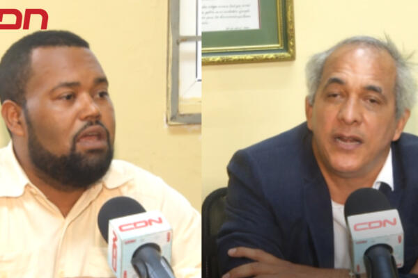 Catedráticos del derecho John Garrido y Franklin Mercado. 