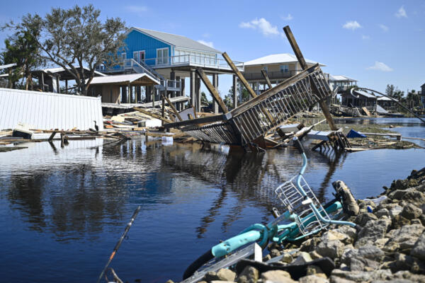Rastros de destrucción con varias áreas aún bajo alerta de inundaciones. (Foto de Miguel J. Rodríguez Carrillo / AFP)
