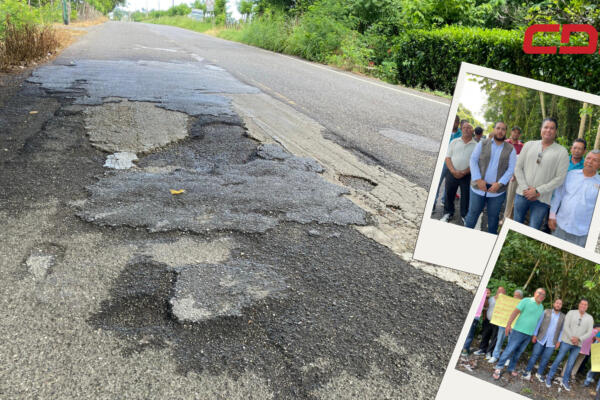 Autoridades municipales junto a transportistas que reclaman arreglo de calle.