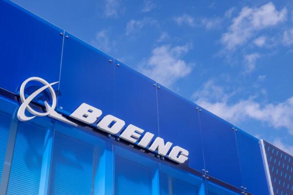 The Boeing Co. logo on the company's stand during the opening day of the Farnborough International Airshow in Farnborough, UK, on Monday, July 22, 2024. The aviation summit is typically a platform for planemakers to rack up multibillion-dollar deals. Photographer: Jason Alden/Bloomberg
