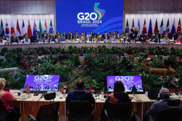 epa11494290 The President of Brazil, Luiz Inacio Lula da Silva (C), speaks during the opening of the Global Alliance against Hunger and Poverty meeting at the G20 Brazil 2024, held at the headquarters of the NGO Acao da Cidadania in Rio de Janeiro, Brazil, 24 July 2024. Lula da Silva introduced the Global Alliance against Hunger and Poverty and expressed regret that hunger continues to be the most challenging issue for humanity in the 21st century.  EPA/ANDRE COELHO