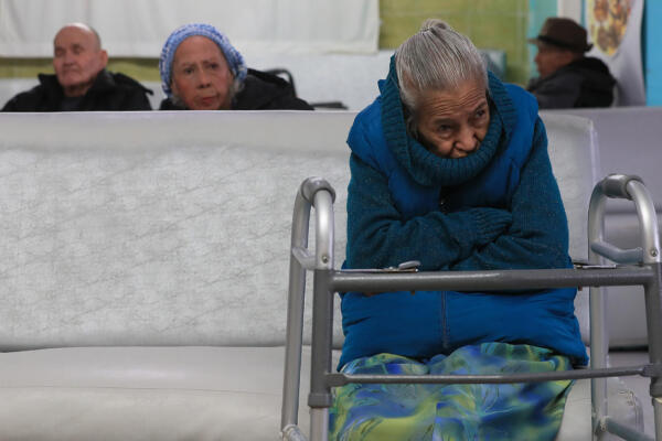 Fotografía donde se observa a una adulta mayor en el asilo Senecú de Ciudad Juárez en Chihuahua México