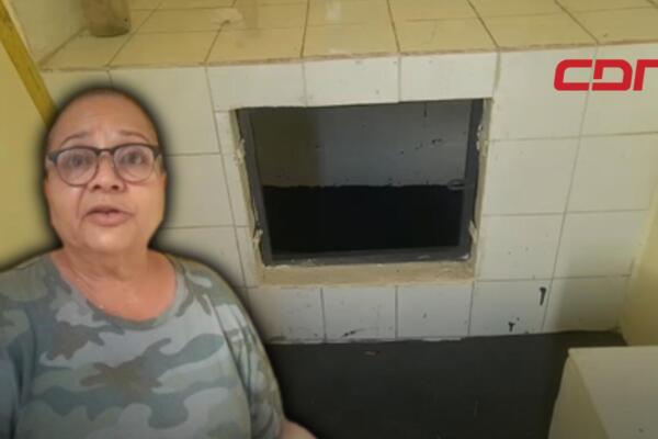 Gladis Ortega, quien denuncia el robo de las cenizas de su hermano de cementerio en La Vega. 