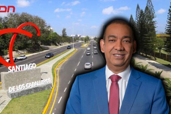 Deligne Ascención Burgos, Ministro de Obras Públicas y Comunicaciones.