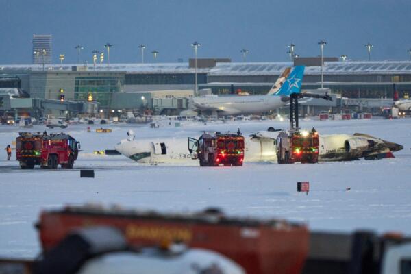 Un avión de Delta Air Lines se estrelló este lunes con 80 pasajeros. (Geoff Robins / AFP)