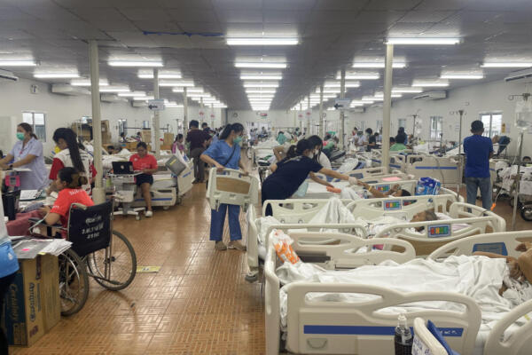 Patients are attended to in a makeshift medical treatment area in the canteen of a hospital in Bangkok on March 29, 2025 at a hospital in Bangkok on March 29, 2025, a day after an earthquake struck central Myanmar and Thailand. Rescuers dug through the rubble of collapsed buildings on March 29 in a desperate search for survivors after a huge earthquake hit Myanmar and Thailand, killing more than 150 people. (Photo by Montira RUNGJIRAJITTRANON / AFP)