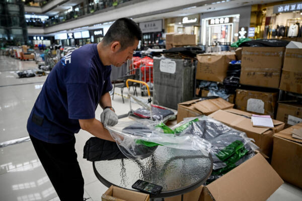 Trump sugiere reducir al 80% los aranceles impuestos a productos chinos. (foto, AFP)