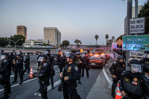 California Highway Patrol (CHP) close the bridges and the access to the 101 Freeway after curfew was put into effect following days of protests in response to federal immigration operations in Los Angeles on June 10, 2025. Los Angeles police began arresting people in the city's downtown late on June 10, as groups gathered in violation of an overnight curfew after a fifth day of protests against Donald Trump's immigration crackdown. (Photo by Apu GOMES / AFP)