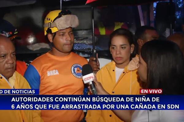 Autoridades buscan a niña arrastrada por cañada durante aguacero en Villa Mella 