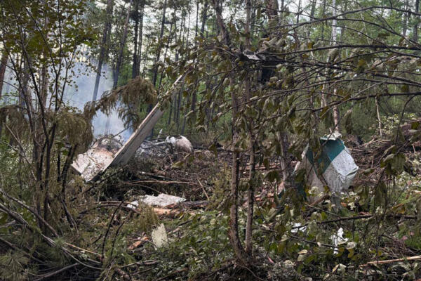 This handout picture released by the Far Eastern Transport Prosecutor's Office on July 24, 2025, shows what it said is the crash site of the Antonov AN-24 passenger plane outside the town of Tynda in Russia's far eastern Amur region. Rescuers found no survivors at the site where a plane crashed in Russia's far eastern Amur region earlier on July 24, 2025, Russian state media reported. (Photo by Handout / Far Eastern Transport Prosecutor's Office / AFP) / RESTRICTED TO EDITORIAL USE - MANDATORY CREDIT 