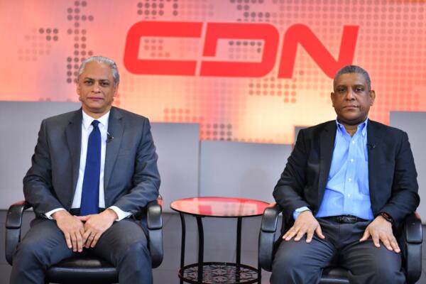 r el Dr. Américo Rodríguez, director nacional de Cedulación, y el Dr. Johnny Rivera, director de Informática 