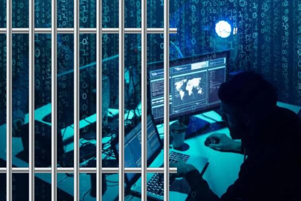 Imagen ilustrativa de un ciberdelincuente y barras de cárcel. Foto: CDN Digital