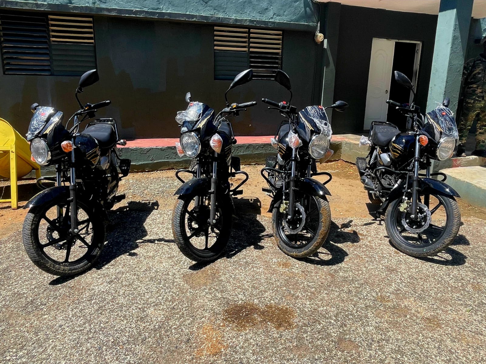 Motocicletas y haitianos