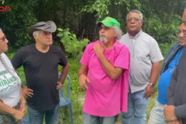 Sacerdotes y activistas medioambientales realizan campamento en Loma Miranda.