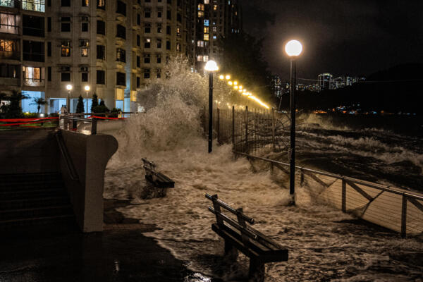 Waves crash as Super Typhoon Ragasa approaches the Heng Fa Chuen residential district in Hong Kong on September 23, 2025. Hong Kong and parts of southern China ground to a halt on the evening of September 23 as Super Typhoon Ragasa approached with high winds and lashing rain, forcing Chinese authorities to shut down schools and businesses in at least 10 cities. (Photo by Leung Man Hei / AFP)