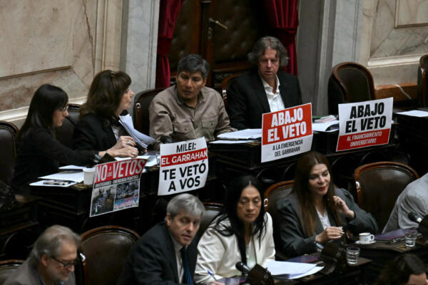 Deputies meet at the National Congress to discuss Argentina's President Javier Milei's vetoes in Buenos Aires on September 17, 2025. Thousands gather outside Argentine Congress to reject Milei's vetoes of laws seeking to remedy the financial straits of public universities and the country's largest pediatric hospital, which have been hit by the ultra-liberal leader's chainsaw. (Photo by Luis ROBAYO / AFP)