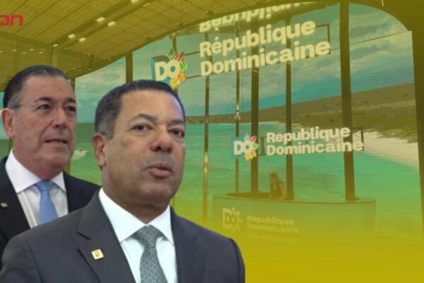 Isidro García, vicepresidente ejecutivo senior de Negocios de Banreservas y Juan Manuel Martín de Oliva, del Área de Negocios Turísticos del Banco Popular.