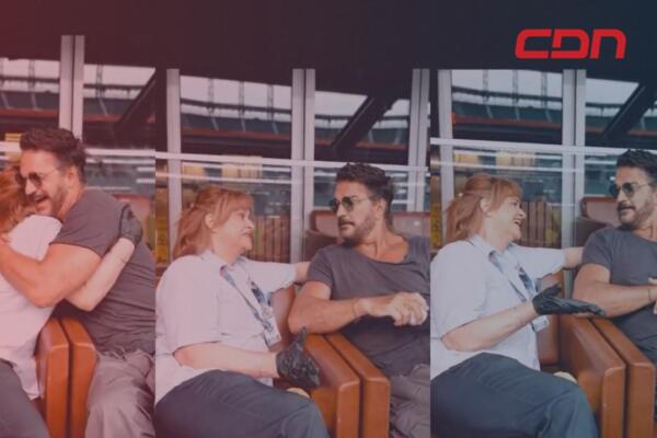 Artista Ricardo Arjona junto a fanática dominicana. 