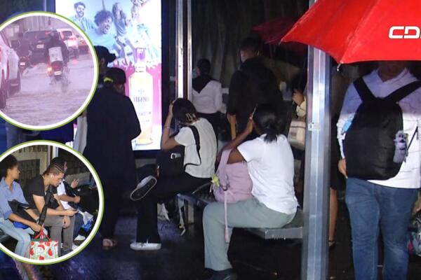Ciudadanos permanecen varados en paradas de guagua debido a lluvias de tormenta Melissa