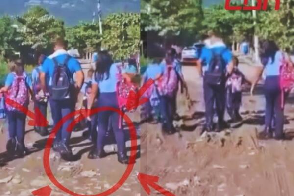 Niños de La Ciénaga de Jacagua usan fundas en los zapatos para llegar a la escuela ante el deplorable estado del camino.