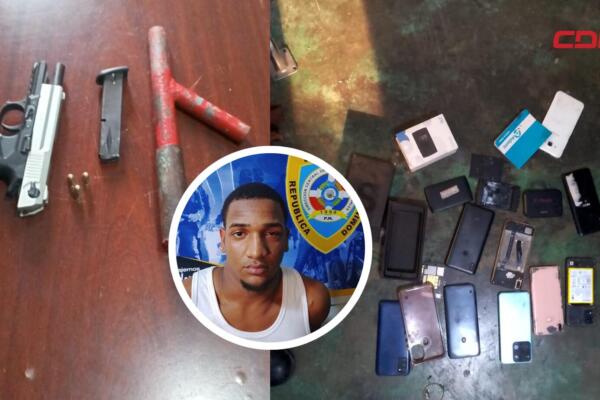 Armas de fuego y teléfonos celulares ocupados por la Policía Nacional durante el arresto de un hombre en Villa Altagracia.