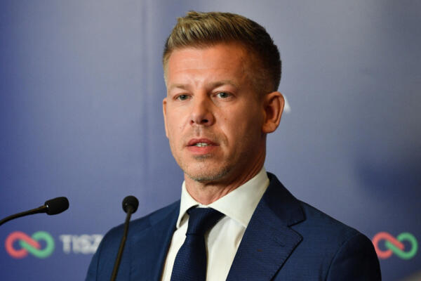 Peter Magyar, leader of the pro-European conservative TISZA party, makes a statement in Budapest during the general election in Hungary, on April 12, 2026. Polls closed in Hungary's parliamentary election, with turnout reaching a record high in the crunch vote that sees nationalist Prime Minister Viktor Orban's 16-year stint in power face an unprecedented challenge from conservative political newcomer Peter Magyar. (Photo by Ferenc ISZA / AFP) / ALTERNATIVE CROP
