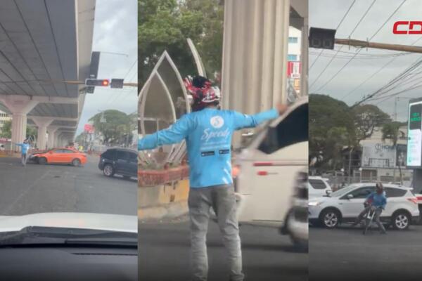 Motociclista abre paso y salva ambulancia en tapón de Santiago