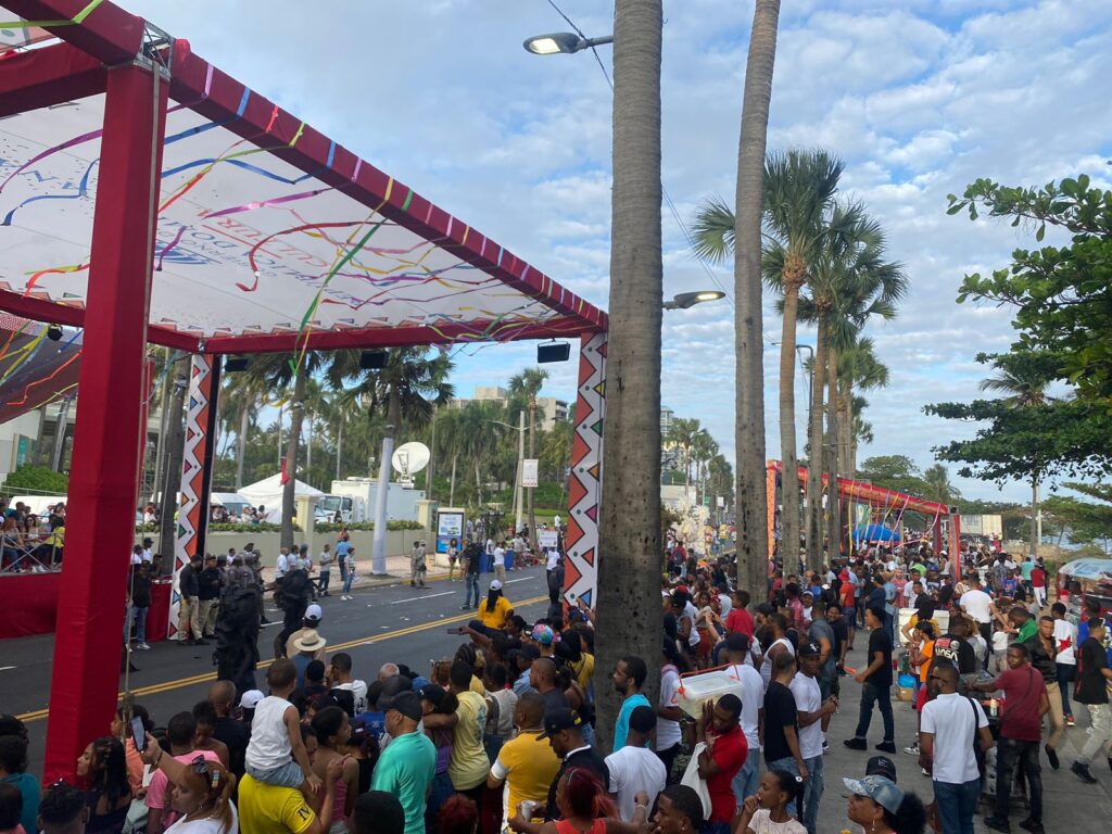 Dominicans and tourists enjoy the carnival on the Malecón in Santo Domingo