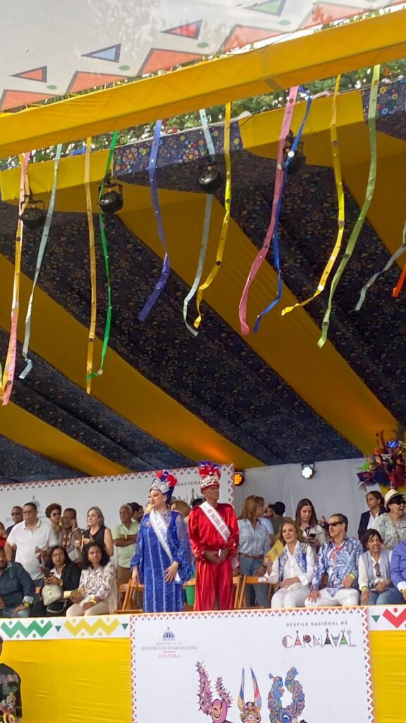 Dominicans and tourists enjoy the carnival on the Malecón in Santo Domingo