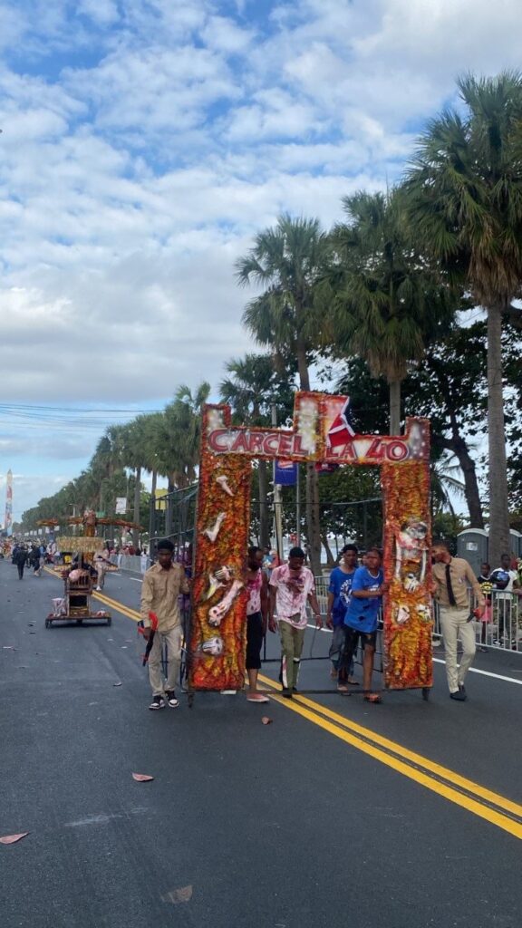 Dominicans and tourists enjoy the carnival on the Malecón in Santo Domingo